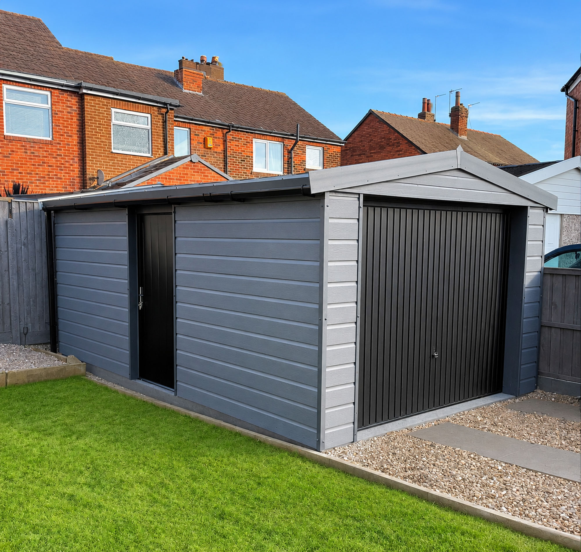 Row of gray metal sheds in a fenced backyard, with red brick houses and a blue sky behind.