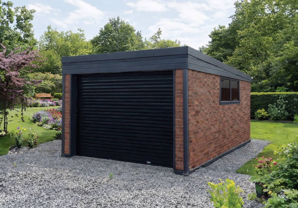 Brick garden shed with a black roller garage door in a landscaped backyard